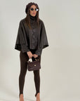 Giacca modello a mantella in eco pelle top quality
