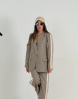 Tailleur giacca e pantaloni con riga laterale